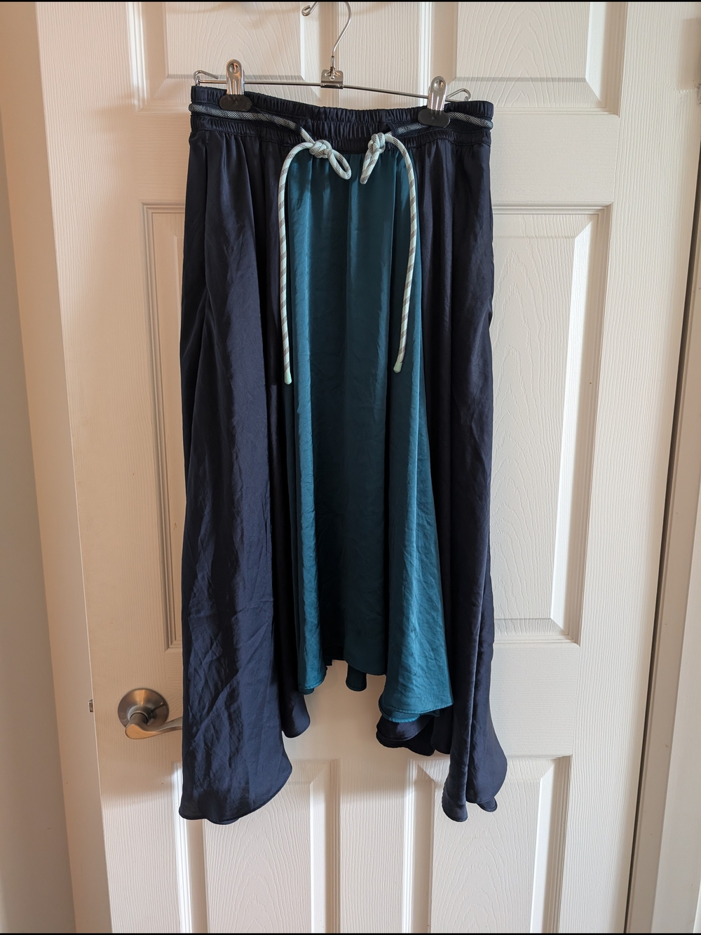 The Lululemon Roxanda face forward  Two-Tone Asymmetrical Skirt - Navy & Teal